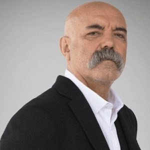 Актер Эрджан Кесал